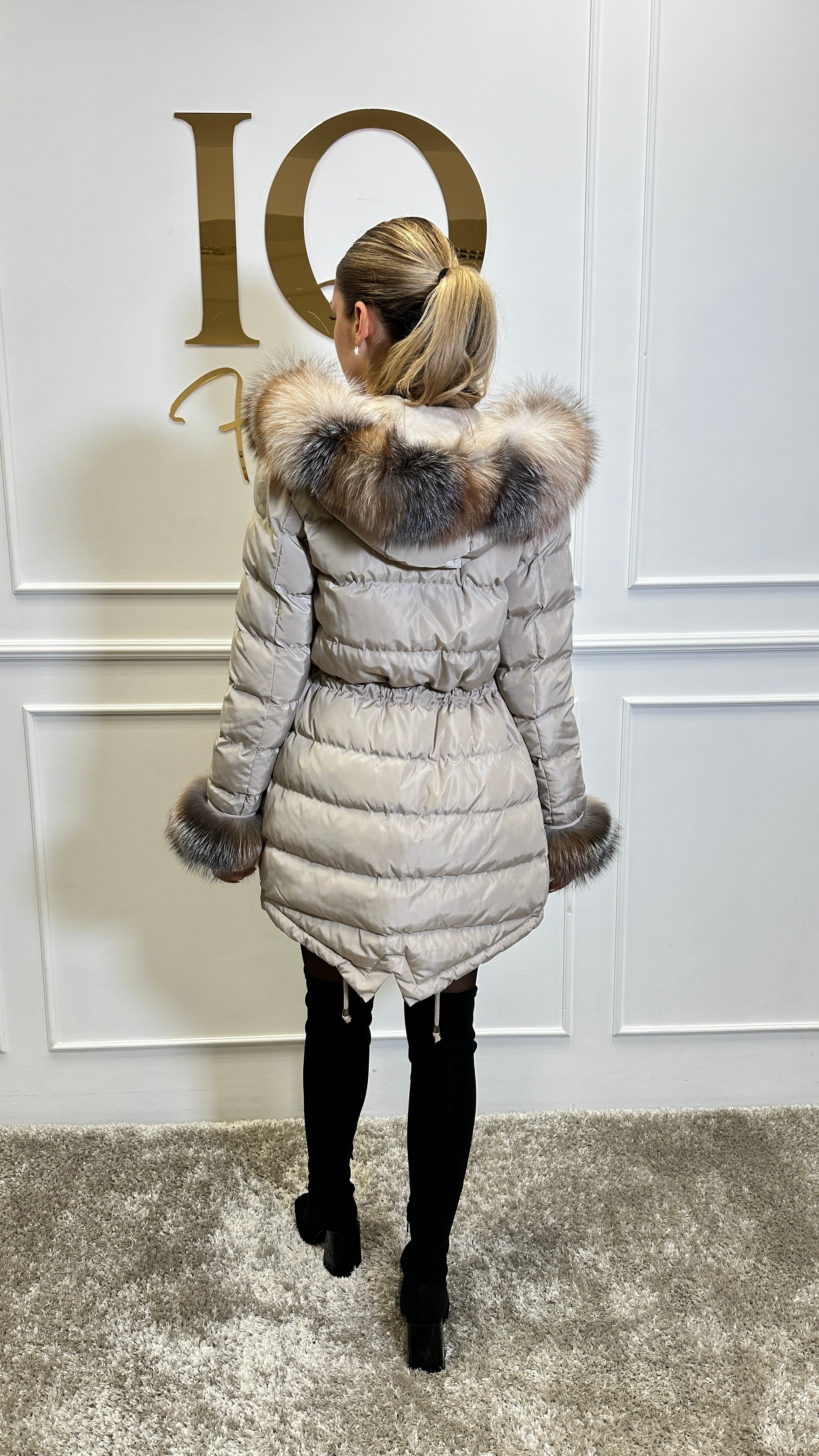 Beige Anatolia Haina parka by ELVE STYLE SRL, stylish blanuri jacket with hood and quilted design, displayed on a hanger.