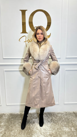Beige leather coat by iqfashioncluj, Antheea blanuri style, shown on a hanger with detailed leather texture.