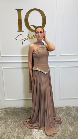 Beige Rochie Elissa by iqfashioncluj displayed on a hanger, showcasing elegant fabric and stylish design details.