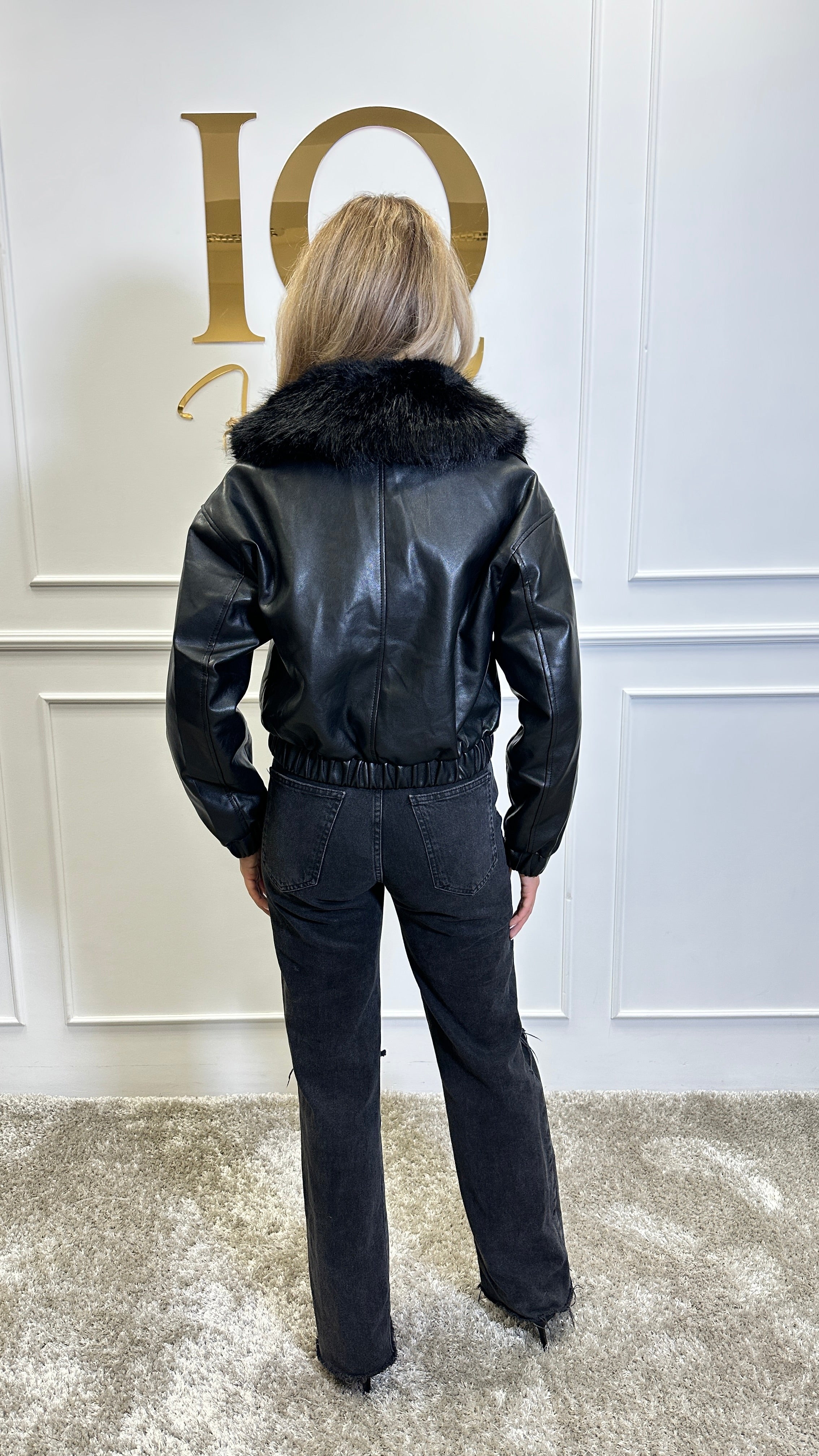 Black eco-leather blazer with faux fur collar from Elve Style SRL, stylish and warm for winter wear.