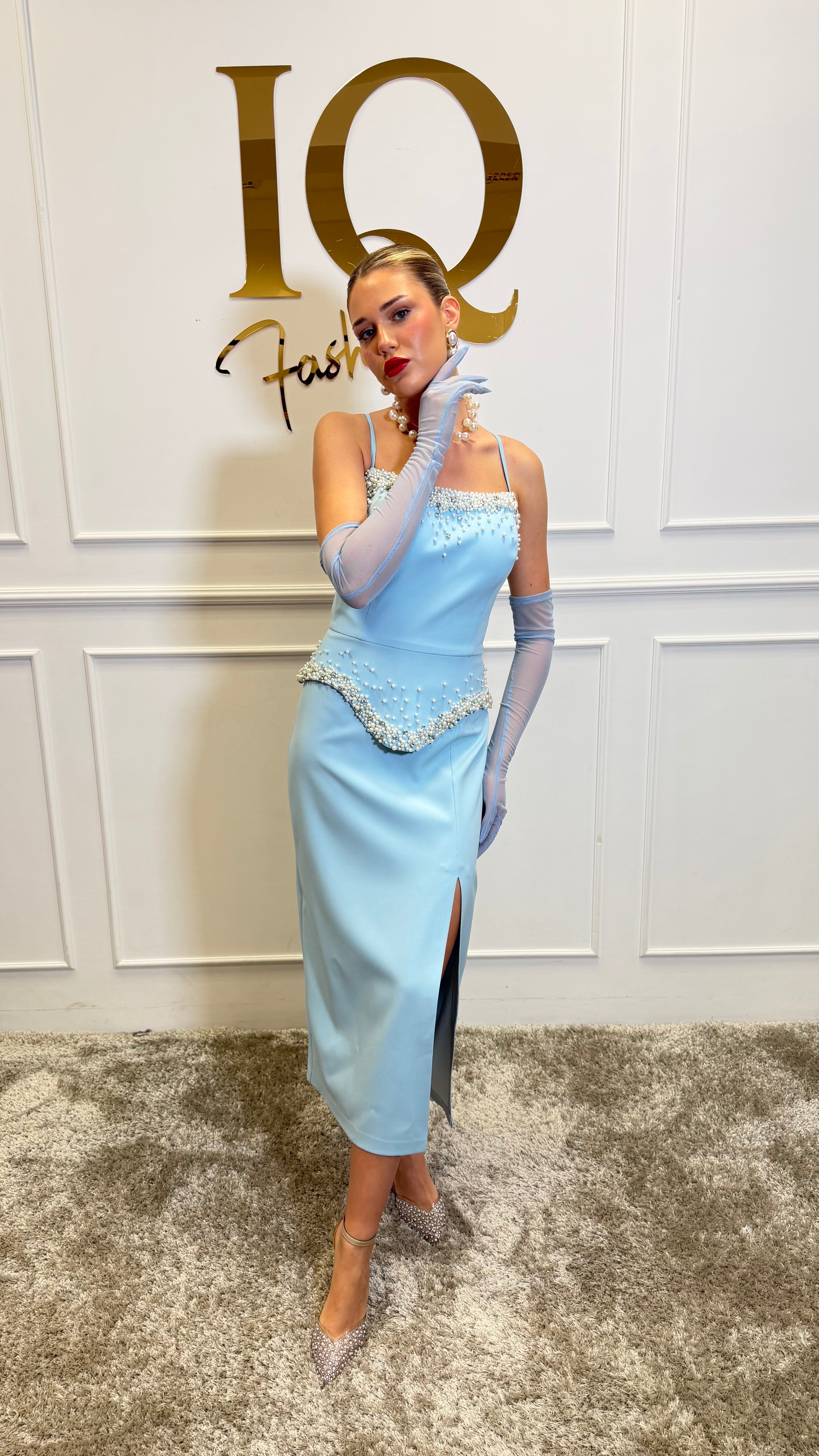 Rochie bleu Candolline de la iqfashioncluj, model elegant cu croială modernă, vizibilă pe imagine.
