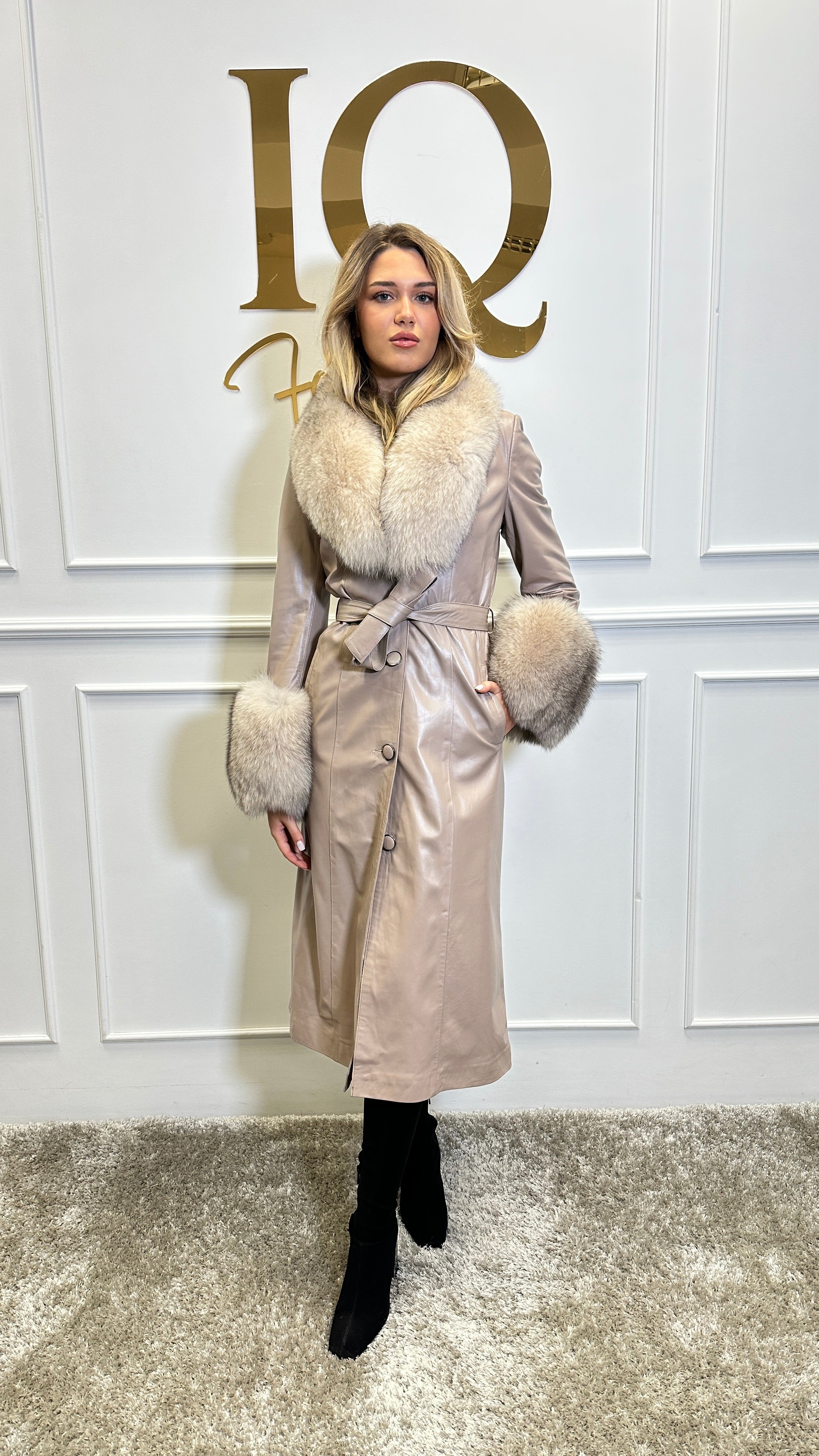 Beige leather coat from iqfashioncluj, stylish blanuri Pardesiu piele Antheea in soft beige color, shown hanging on a hanger.